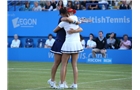 EASTBOURNE, ENGLAND - JUNE 21:  Hao-Ching and Yung-Jan Chan of Chinese Taipei celebrates beating Martina Hingis of Switzerland and Flavia Pennetta of Italy during their Women's Doubles Finals match on day eight of the Aegon International at Devonshire Park on June 21, 2014 in Eastbourne, England. (Photo by Jan Kruger/Getty Images)